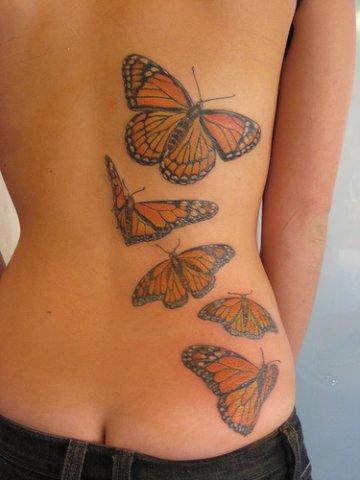 tatuagem feminina no p�. tattoo feminina nas costas. a maioria das tatuagens femininas nas costelas é